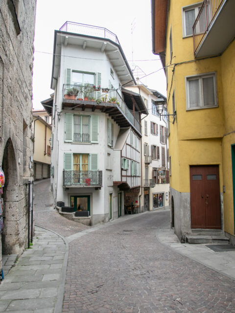 Charming view of Lovere's traditional Italian architecture with cobbled streets and historic buildings