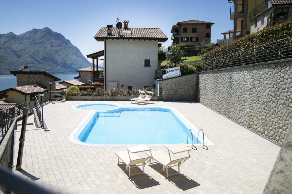 Sunny poolside haven at Casa Cuneo with panoramic views by Fabula Home Rental