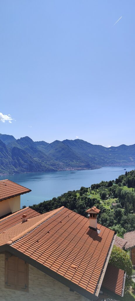 The serene waters of Lake Iseo close-up, as seen from Casa il Nido, a prized Fabula Home Rental property