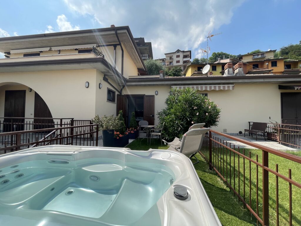 Private hot tub oasis with a homely backdrop at Casa il Nido, part of Fabula Home Rental's exclusive collection