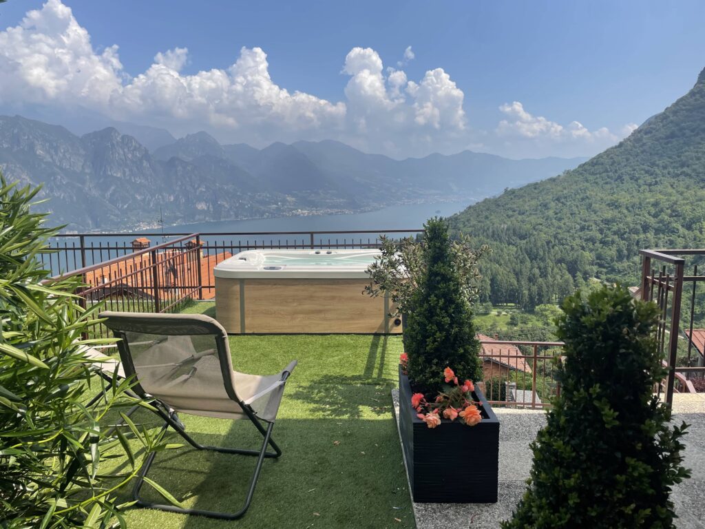 Exclusive outdoor hot tub with a stunning view of Lake Iseo at Casa il Nido by Fabula Home Rental