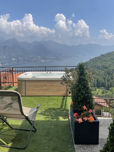 Exclusive outdoor hot tub with a stunning view of Lake Iseo at Casa il Nido by Fabula Home Rental