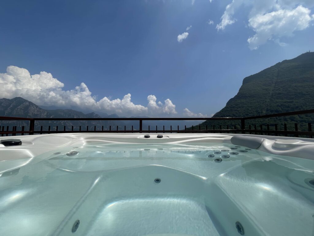 Gaze upon the open sky from the comforting waters of Casa il Nido's hot tub, courtesy of Fabula Home Rental