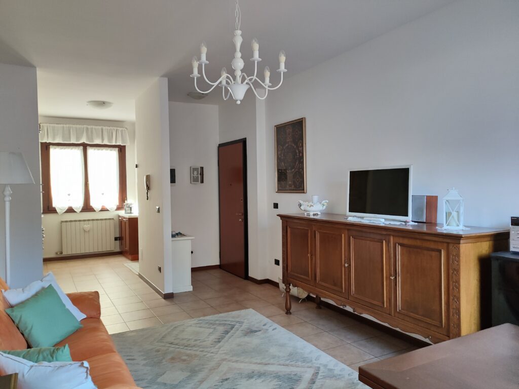 Spacious living room with natural light and sophisticated decor at GiannaRosa Apartment, Lovere