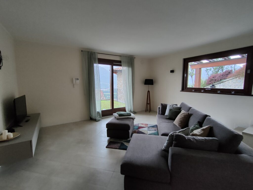 Luxurious lounge area with modern furnishings in Iseo Fabula Home Rental