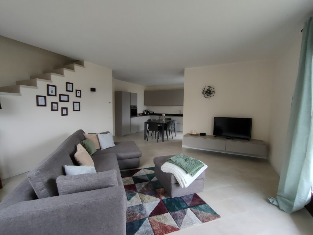 Open concept living space with elegant design at Fabula Home Rental Iseo