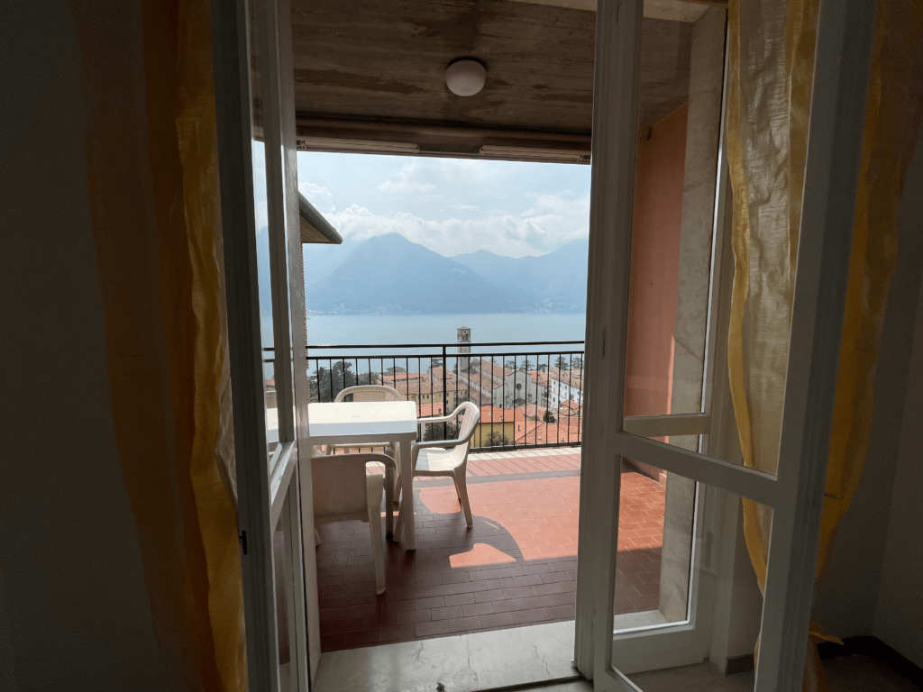 Open window view of Lake Iseo from Casa Pluto's cozy interior