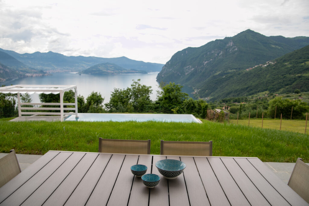 Al fresco dining setup overlooking the serene Lake Solto