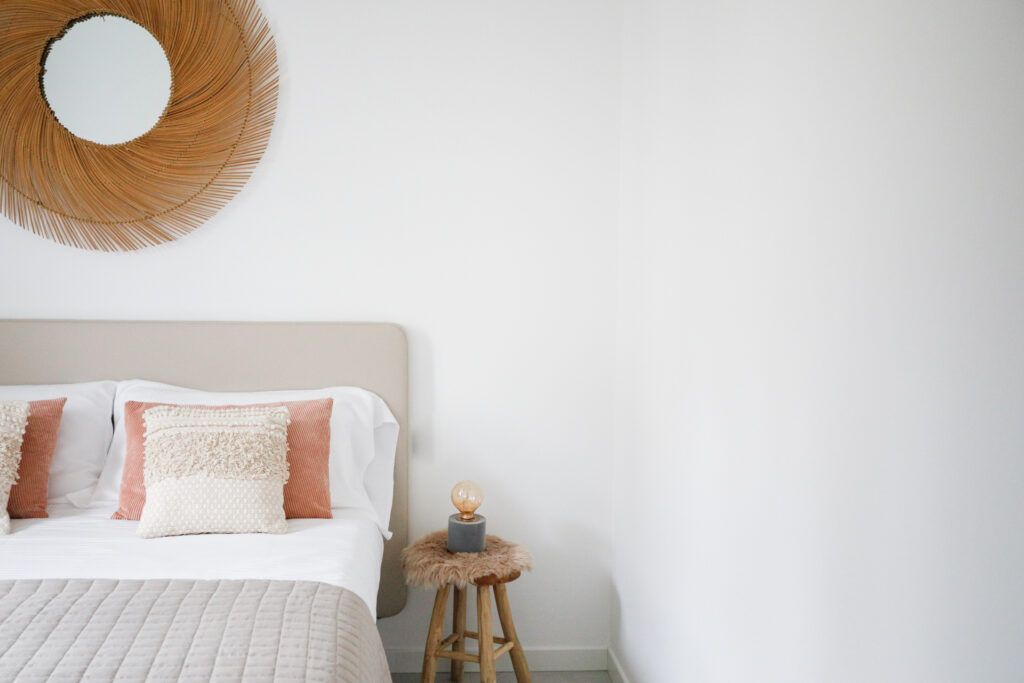 A serene bedroom in Seliera with tasteful decor reflecting Iseo Lake's tranquil vibe