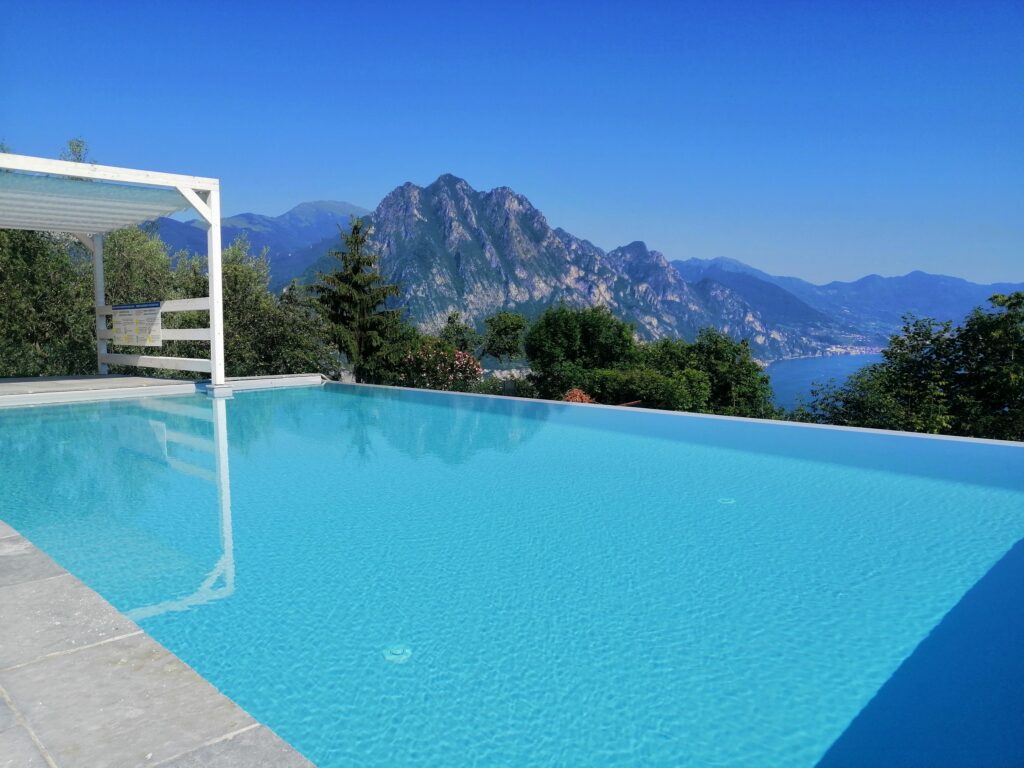 Seliera's crystal blue pool offering a panoramic view of the beautiful Iseo Lake