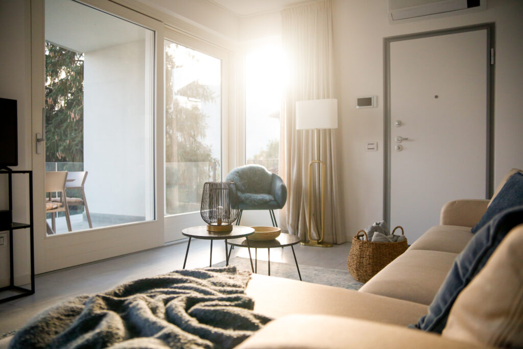 Morning light streaming into the cozy living room at Seliera, Iseo Lake