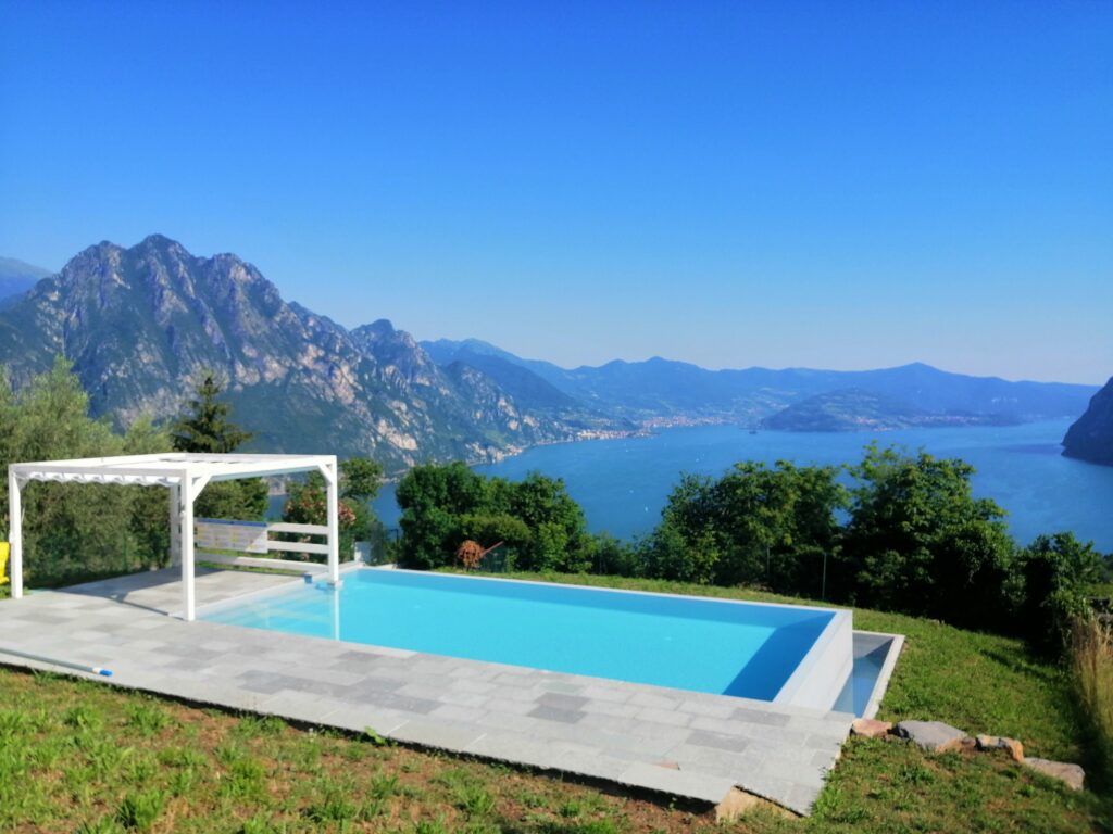 Infinity pool at Seliera with stunning views of Iseo Lake and the mountains