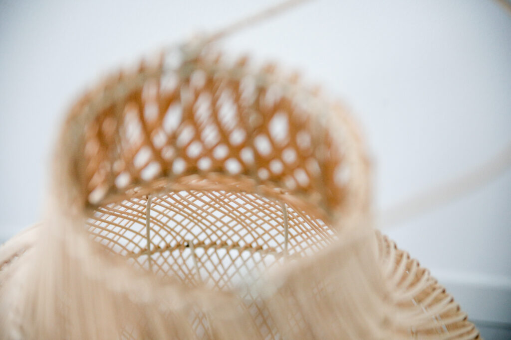 Close-up of a delicately woven lampshade in Seliera apartment, showcasing intricate craftsmanship