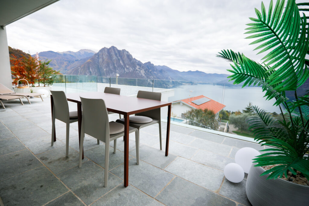 Trivia Bellavista’s balcony view showcasing the infinity pool and mountain scenery