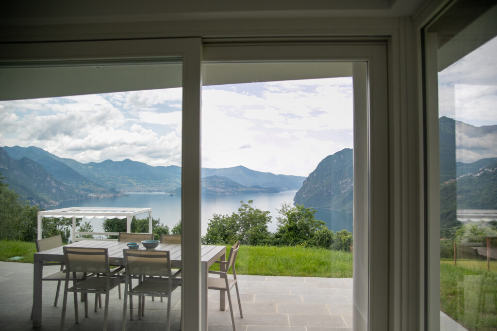 Art-inspired decor at Trivia Resort with a backdrop of Lake Iseo