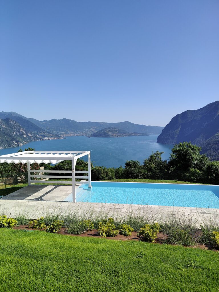 Breathtaking infinity pool at Trivia Resort offering panoramic views of Lake Iseo