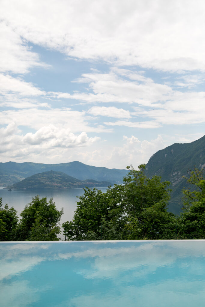 Infinity pool at Trivia Resort overlooking the expansive Lake Iseo