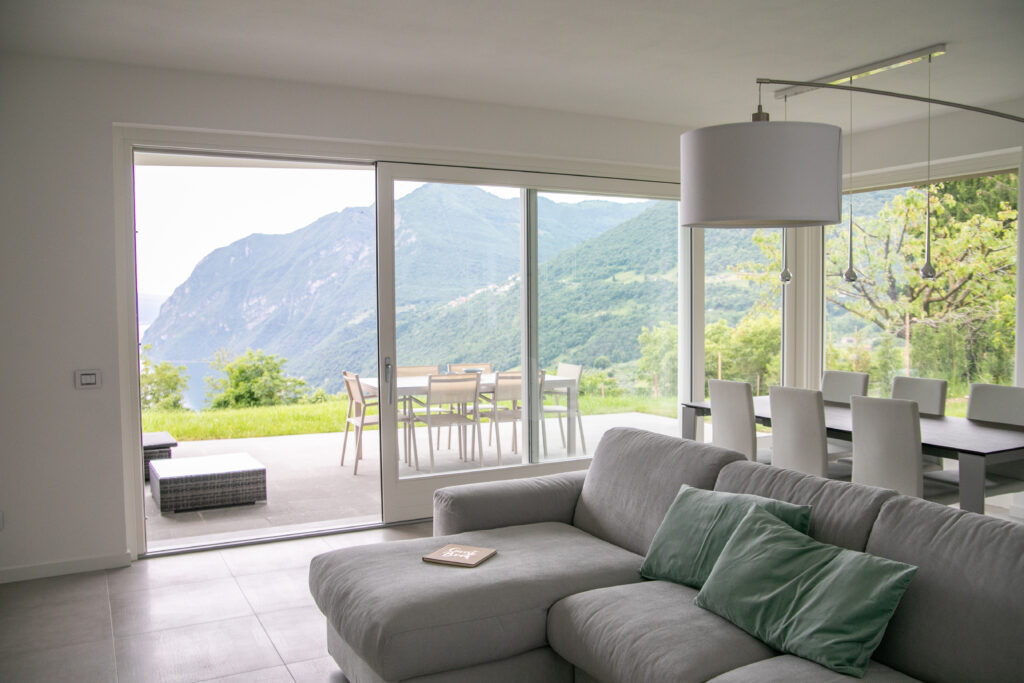 Serene living room at Trivia Resort with expansive views of Lake Iseo