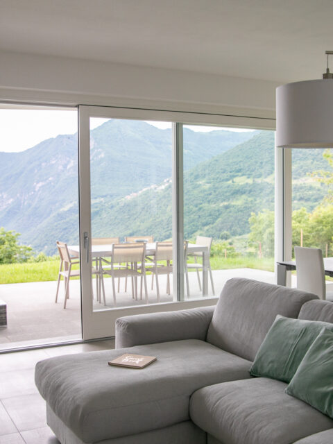 Serene living room at Trivia Resort with expansive views of Lake Iseo