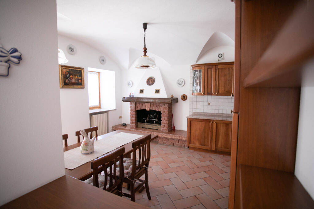 Dining area with arched ceilings and rustic charm in Villa Simone