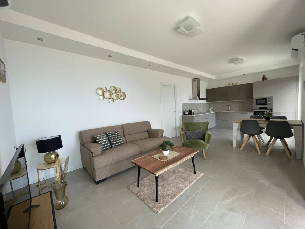 Open concept living area with modern kitchen at Wonder House