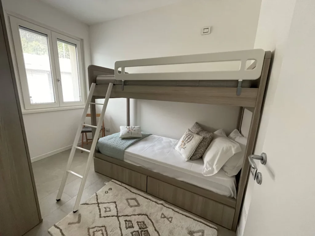 Cozy bunk bedroom with modern furnishings at Wonder House