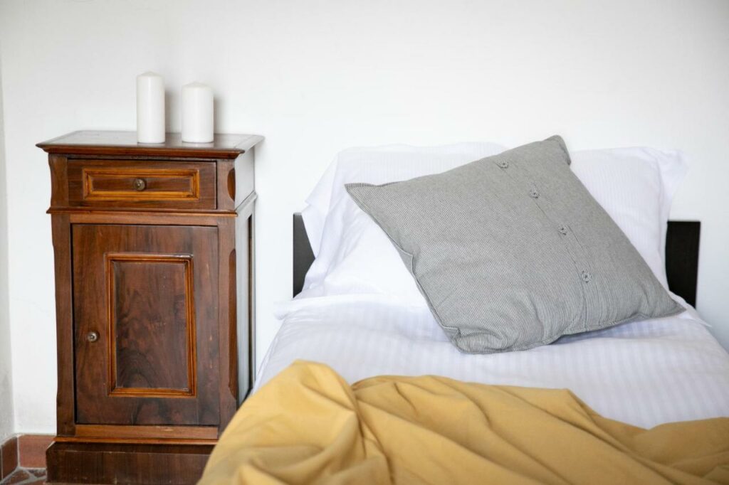 Elegantly decorated bedroom with natural light in La Stallina Penthouse, Monte Isola